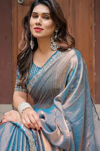 blue chiffon embroidered border saree with embroidered blouse
