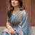 blue chiffon embroidered border saree with embroidered blouse
