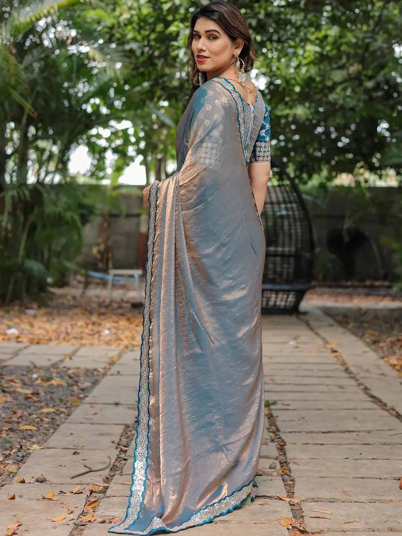 blue chiffon embroidered border saree with embroidered blouse