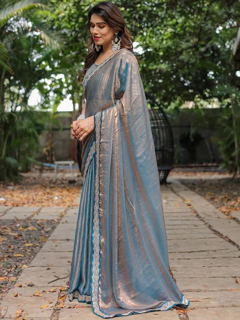blue chiffon embroidered border saree with embroidered blouse