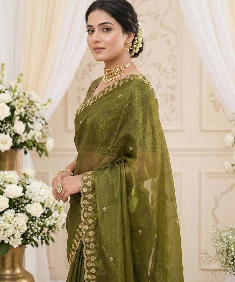 green fancy silk blend shinning embroidered border & blouse saree