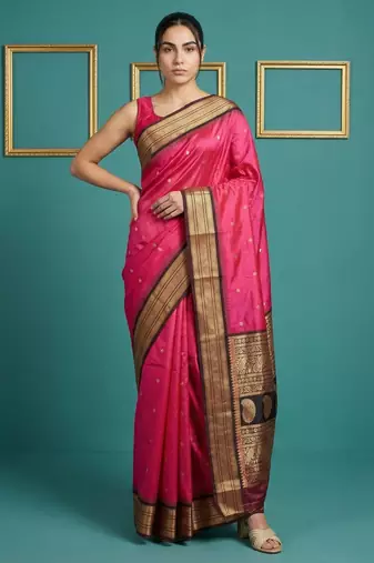 rani pink soft silk blend with gold zari motifs zari woven saree 