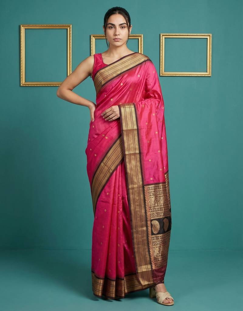 rani pink soft silk blend with gold zari motifs zari woven saree 