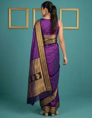 purple soft silk blend with gold zari motifs zari woven saree  4