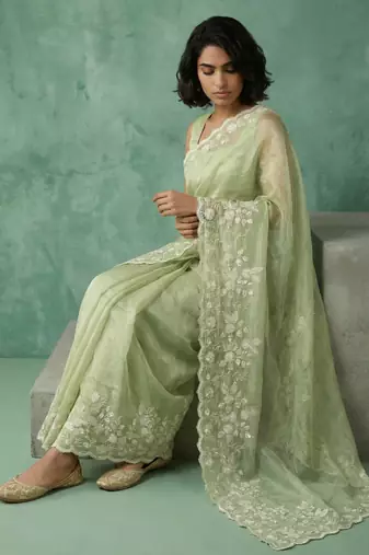 pista chanda silk blend with floral -zari embroidered saree 