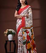 Off white  malmal cotton saree with multicolor tribal art handblock print & red border design