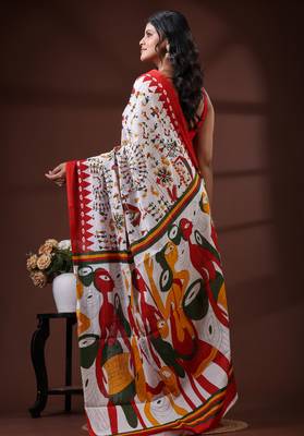 Off white  malmal cotton saree with multicolor tribal art handblock print & red border design 3