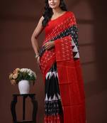 Crimson red & black  malmal cotton saree with traditional batik inspired handblock print design