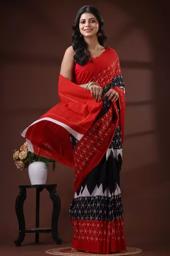 Crimson red & black  malmal cotton saree with traditional batik inspired handblock print design
