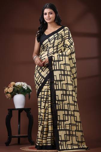 Beige & black geometric printed  malmal cotton saree with contrast border