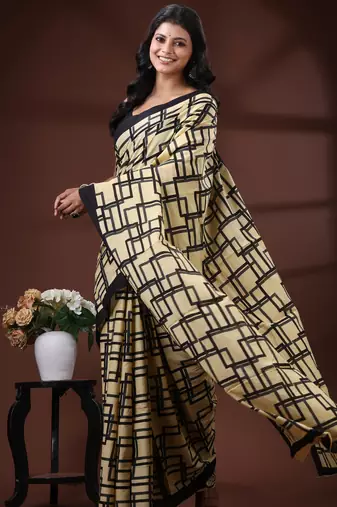 Beige & black geometric printed  malmal cotton saree with contrast border