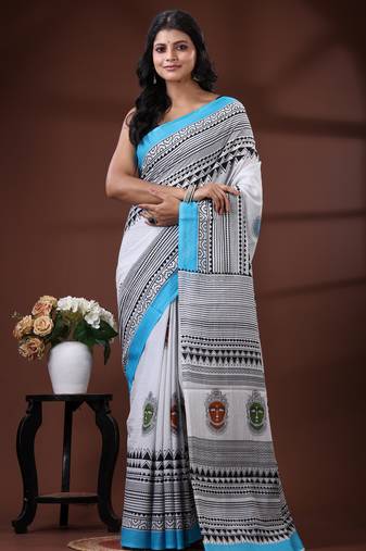 White & sky blue  malmal cotton saree with tribal face motif and geometric handblock print design