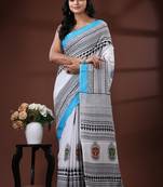 White & sky blue  malmal cotton saree with tribal face motif and geometric handblock print design