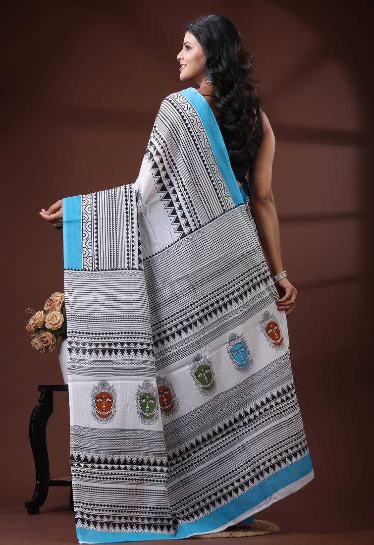 White & sky blue  malmal cotton saree with tribal face motif and geometric handblock print design