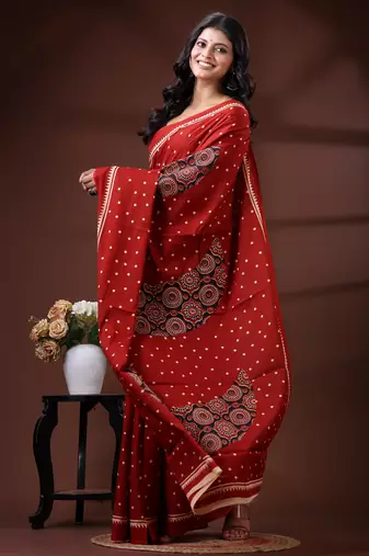 Crimson red  malmal cotton saree with polka dot design