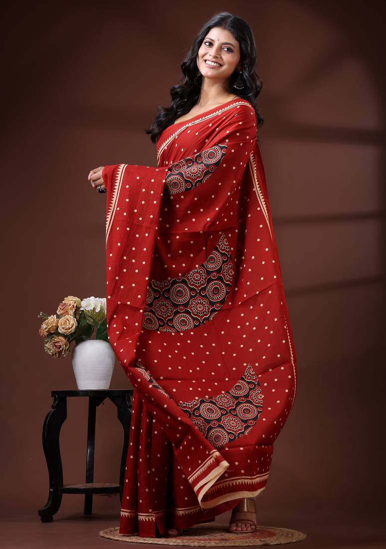 Crimson red  malmal cotton saree with polka dot design