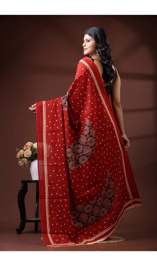 Crimson red  malmal cotton saree with polka dot design
