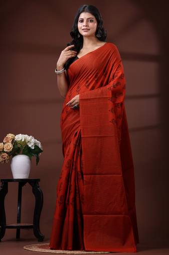 Rust orange & black paisley printed  malmal cotton saree with striped pallu