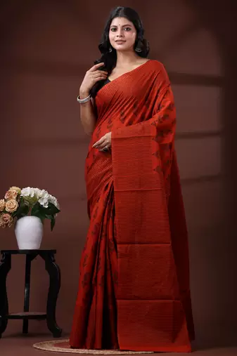 Rust orange & black paisley printed  malmal cotton saree with striped pallu