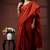 Rust orange & black paisley printed  malmal cotton saree with striped pallu