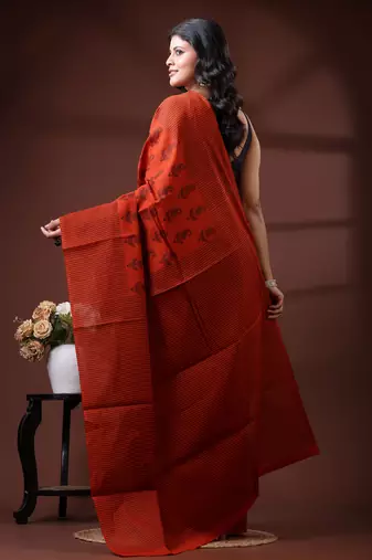 Rust orange & black paisley printed  malmal cotton saree with striped pallu