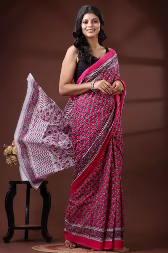 Pink & white floral printed  malmal cotton saree with zigzag border design