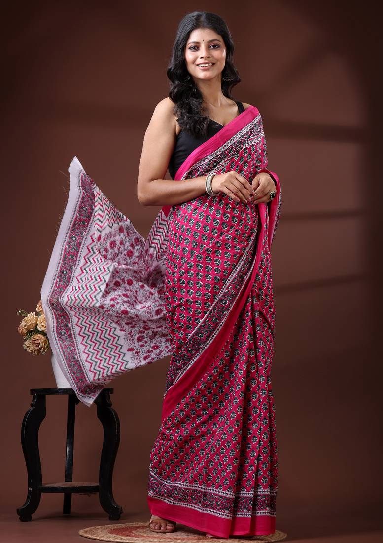 Pink & white floral printed  malmal cotton saree with zigzag border design
