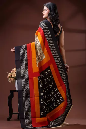 Beige  malmal cotton saree with newspaper & typography print in red and black