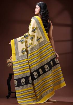 Beige  malmal cotton saree in yellow floral buti print with contrast border 3