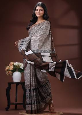 Coffee brown  malmal cotton saree in ethnic batik print with geometric block pallu 2