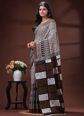 Coffee brown  malmal cotton saree in ethnic batik print with geometric block pallu 3
