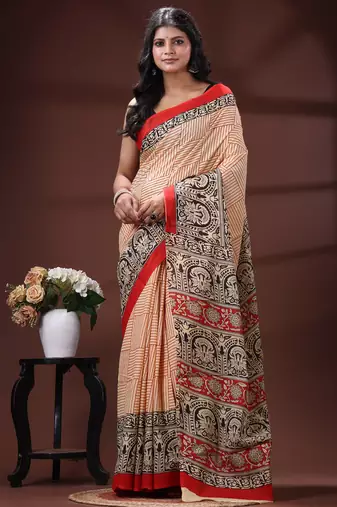 Cream  malmal cotton saree in black handblock kalamkari saree with red contrasting border
