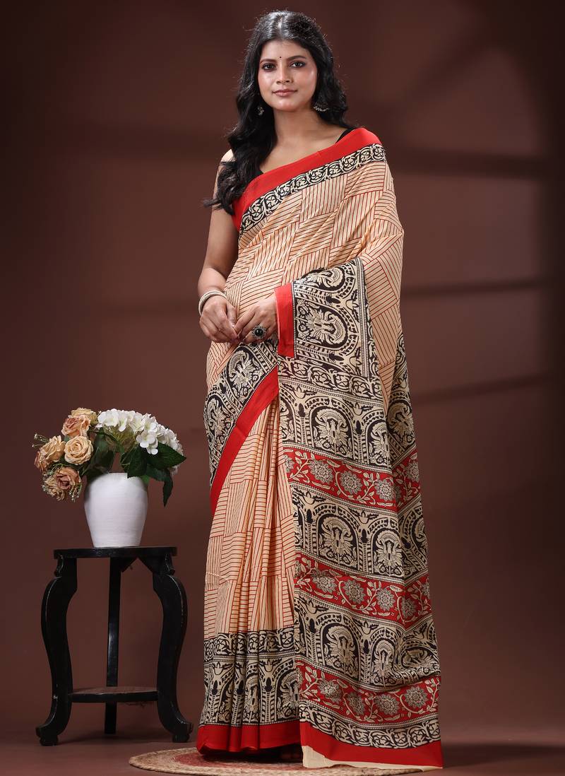 Cream  malmal cotton saree in black handblock kalamkari saree with red contrasting border