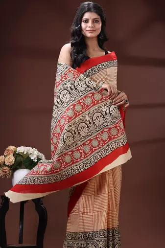 Cream  malmal cotton saree in black handblock kalamkari saree with red contrasting border