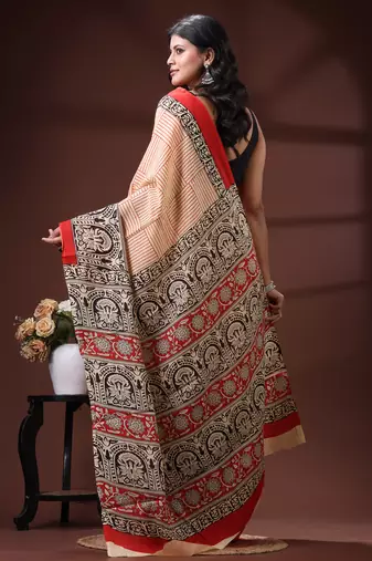Cream  malmal cotton saree in black handblock kalamkari saree with red contrasting border