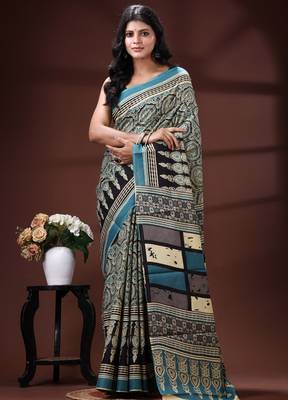 Teal blue  malmal cotton saree in ethnic mandala print with geometric block pallu 1