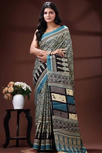 Teal blue  malmal cotton saree in ethnic mandala print with geometric block pallu