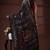 Jet black  silk blend kantha saree with multicolored floral hand-embroidery