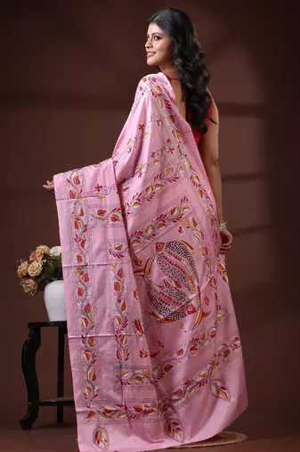 Pastel pink silk blend kantha saree with hand-embroidered fish & vine nakshi pallu
