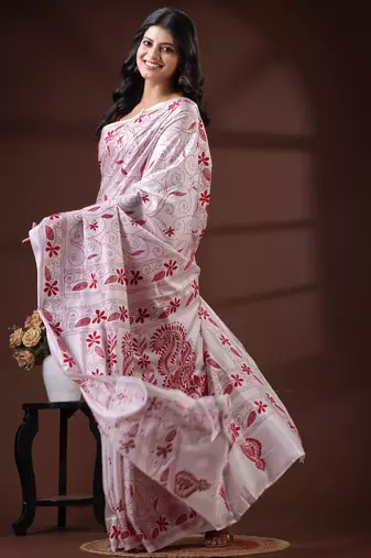 Pristine white silk blend kantha saree with red floral & paisley nakshi work