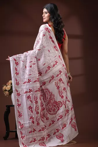 Pristine white silk blend kantha saree with red floral & paisley nakshi work