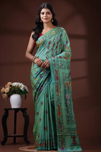 Seafoam green silk blend kantha saree with multicolored floral vine nakshi pallu