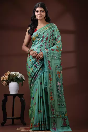 Seafoam green silk blend kantha saree with multicolored floral vine nakshi pallu