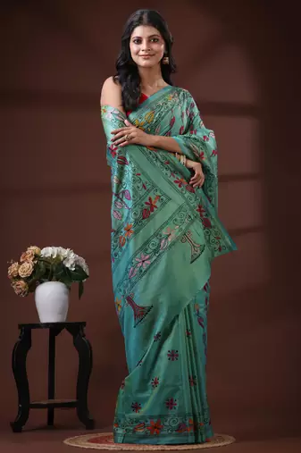 Seafoam green silk blend kantha saree with multicolored floral vine nakshi pallu