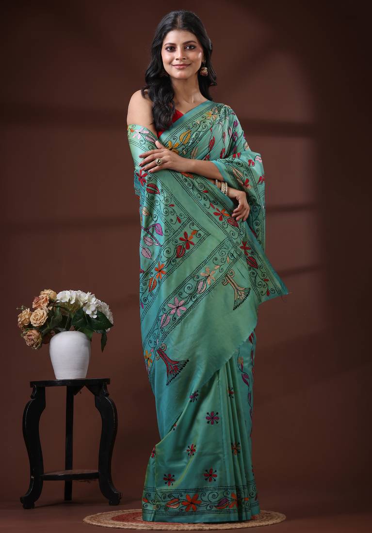Seafoam green silk blend kantha saree with multicolored floral vine nakshi pallu