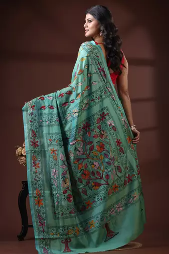 Seafoam green silk blend kantha saree with multicolored floral vine nakshi pallu