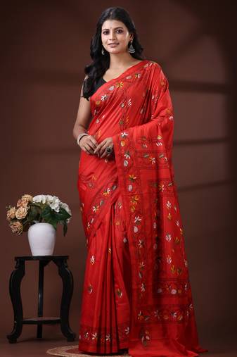 Vibrant red silk blend kantha saree with hand-embroidered peacock nakshi pallu