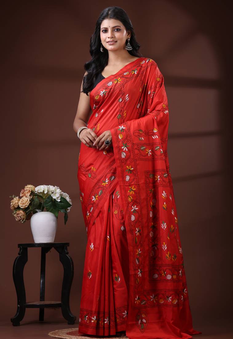 Vibrant red silk blend kantha saree with hand-embroidered peacock nakshi pallu
