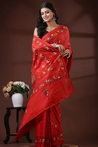 Vibrant red silk blend kantha saree with hand-embroidered peacock nakshi pallu