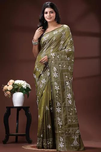 Olive green silk blend kantha saree with intricate white floral nakshi & scalloped pallu